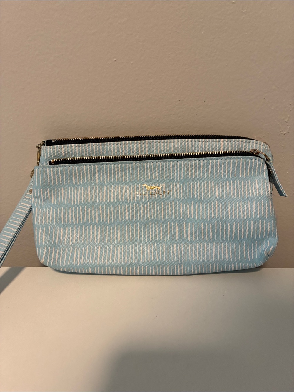 Scout Light Blue Patterned Wristlet with Gold Logo